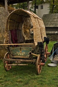 Gypsy wagon with wood wheels and straw cover